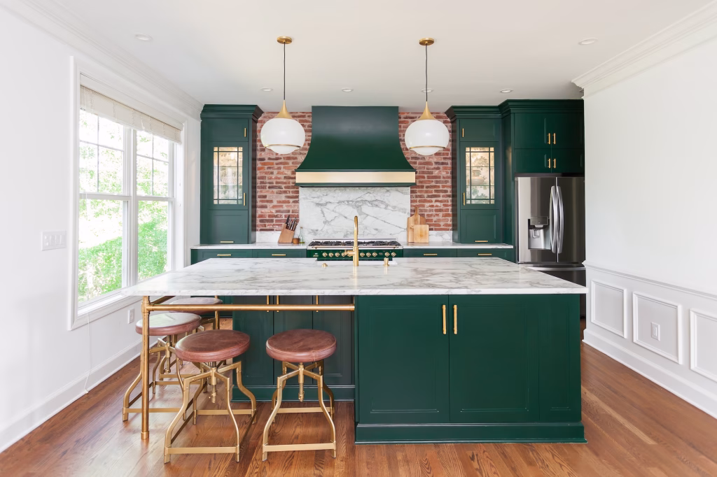 Emerald green jewel-toned cabinetry colors paired with modern Charleston custom home design